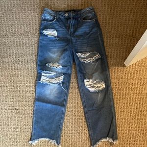 blue high waisted ripped jeans
